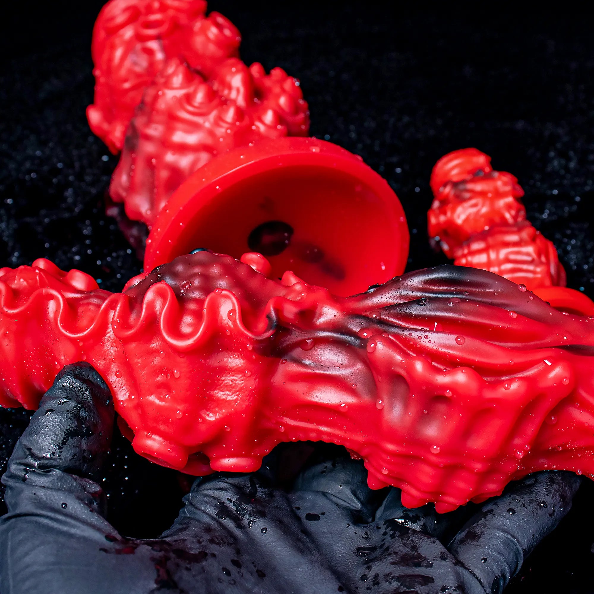Oieffur Abyssal Depths beaded dildo made from medical grade silicone, featuring a realistic design with textured beaded surface.