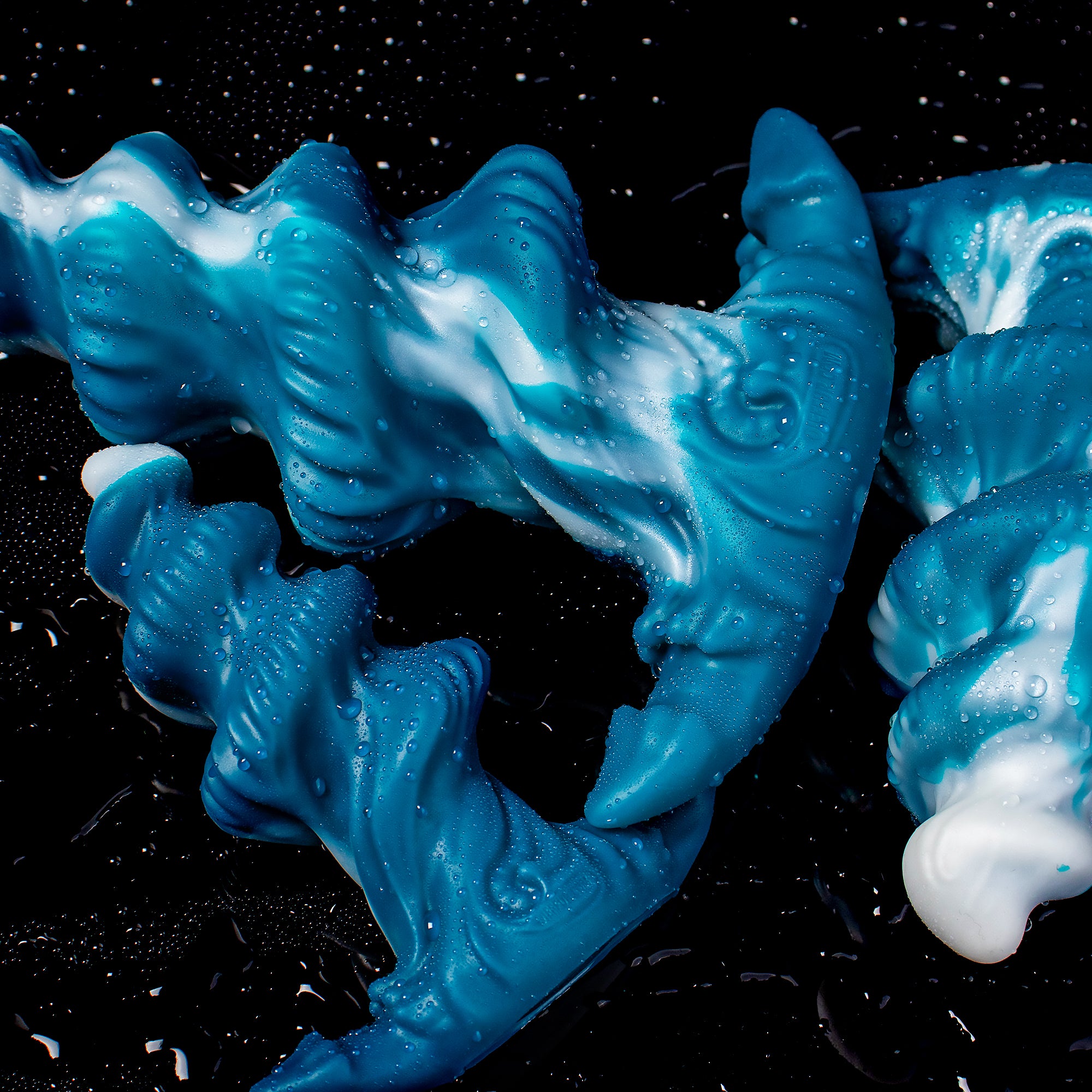 Oieffur Shark Egg Spiral Anal Plug from Fantasy Dildos collection, available in three sizes, with a shiny, textured design.