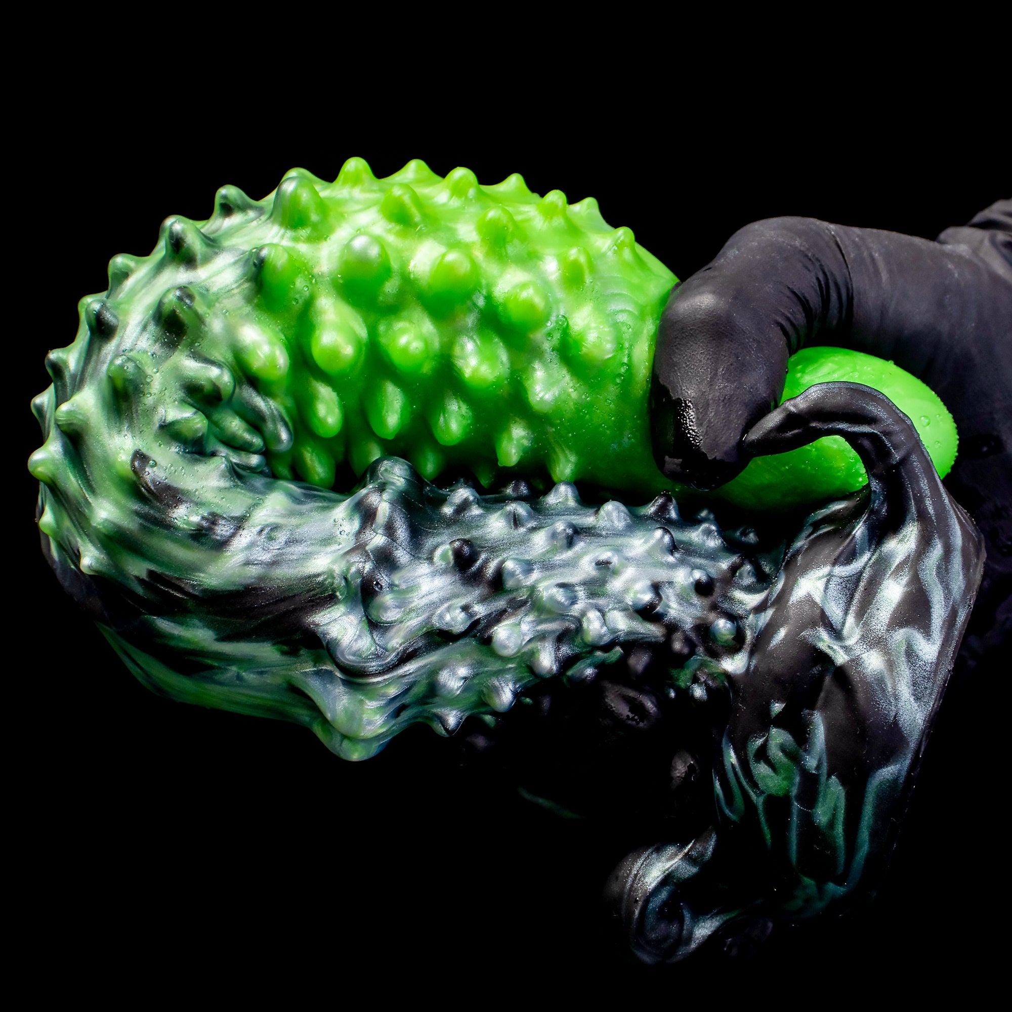 Black "Abyss" spiked dildo by Oieffur, made of platinum silicone, featuring a textured, spiked design for fantasy adult pleasure.