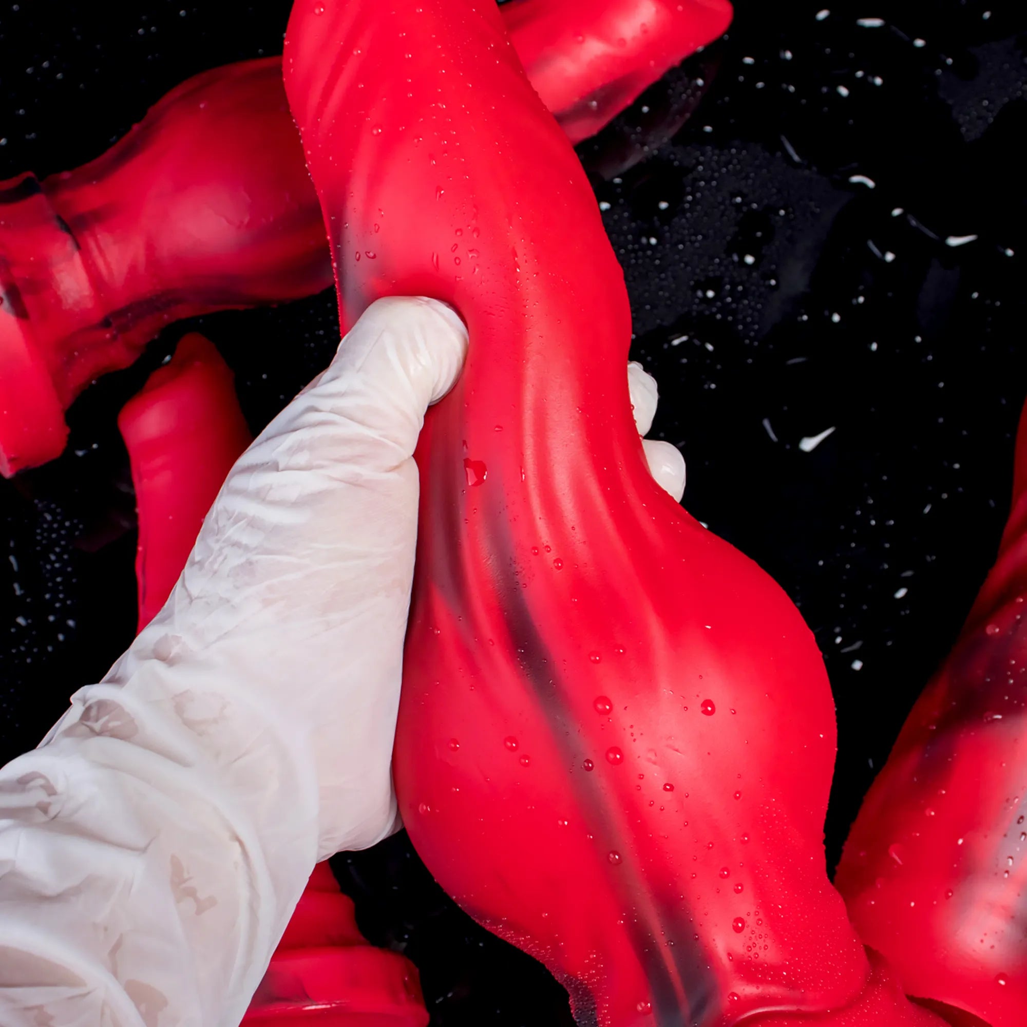 Realistic silicone wolf and dog dildo by Oieffur, detailed textured design resembling a wolf and dog for adult use.