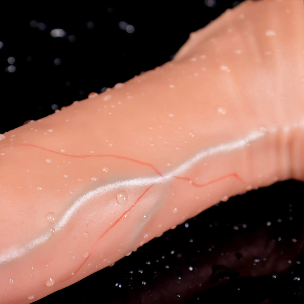 Oieffur Lifelike Sleeve Penis Extender with enhanced length and girth, realistic design, and textured surface for added stimulation.