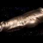 Realistic platinum silicone dog penis sleeve and extender, showing the detailed canine cock design and textured surface.