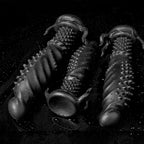 Black Abyss Spiked Dildo by Oieffur, a platinum silicone fantasy dildo with textured spikes for enhanced sensation.