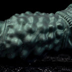 Oieffur Nexus Node Monster Toy fantasy dildo with alien texture in platinum silicone, detailed and realistic design.