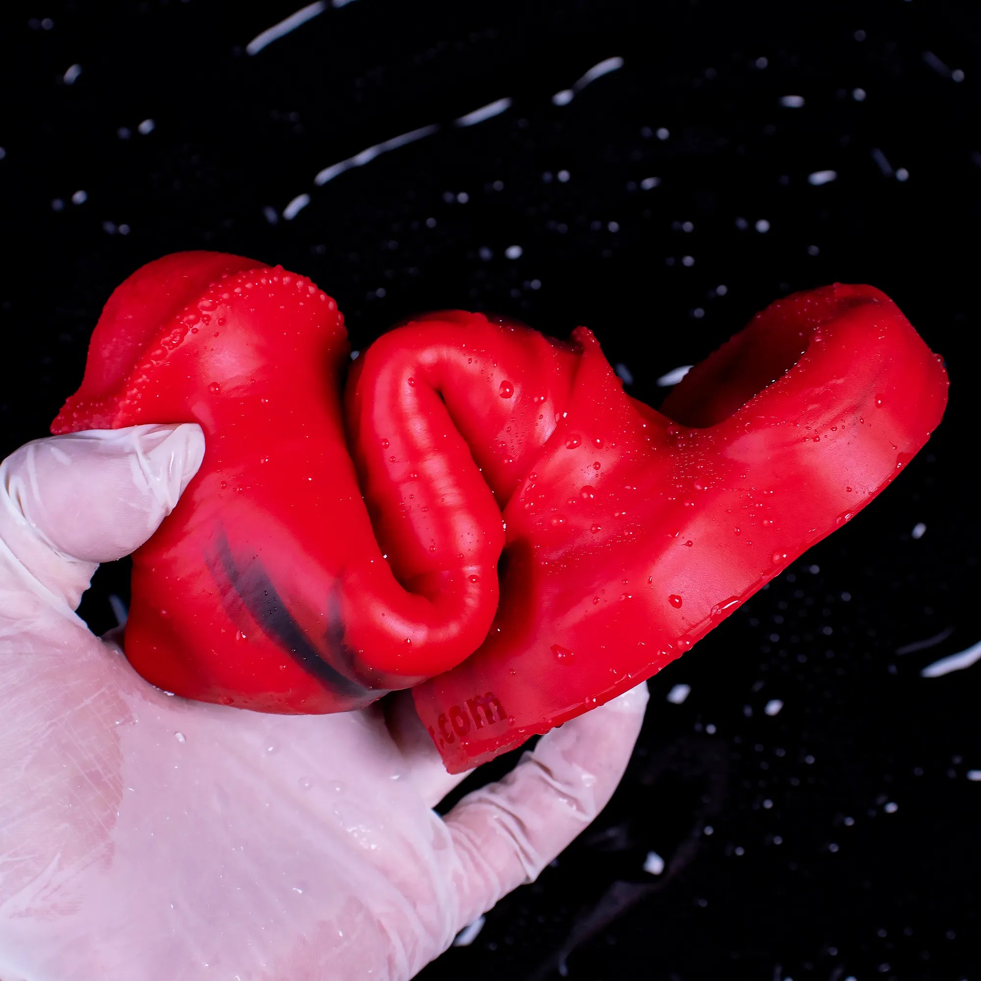 Oieffur male silicone penis sleeve, red penis extender sheath showing girth and length extension for enhanced male pleasure.